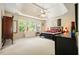 Bedroom featuring natural light, a trey ceiling, and stylish decor at 2004 Spicers Ln, Woodstock, GA 30189
