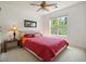 Bedroom with a large window offering natural light and a comfortable bed at 2004 Spicers Ln, Woodstock, GA 30189