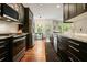 Well-equipped kitchen featuring stainless steel appliances and ample counter space at 2004 Spicers Ln, Woodstock, GA 30189