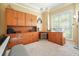 Office featuring built-in wood cabinets and ample storage space at 2004 Spicers Ln, Woodstock, GA 30189