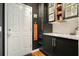 Pantry with cabinets, countertop, and an exterior door at 2004 Spicers Ln, Woodstock, GA 30189