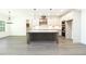 Spacious kitchen with stainless steel appliances, granite countertops, and a large center island at 2117 Ella Springs Dr, Covington, GA 30014