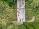 Aerial view of the house surrounded by lush greenery and mature trees at 2575 Flagstone Se Dr, Atlanta, GA 30316