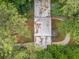Aerial view of the house surrounded by lush greenery and mature trees at 2575 Flagstone Se Dr, Atlanta, GA 30316