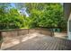 View of wooden deck and backyard with trees at 2575 Flagstone Se Dr, Atlanta, GA 30316