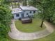 Charming home exterior featuring a modern deck and lush landscaping at 2575 Flagstone Se Dr, Atlanta, GA 30316