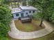 Charming home exterior featuring a modern deck and lush landscaping at 2575 Flagstone Se Dr, Atlanta, GA 30316