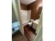Functional bathroom featuring a shower-tub combo, toilet, and single sink vanity at 3613 Tinsley Sw Way, Atlanta, GA 30331