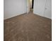 Neutral bedroom featuring carpeted floors and doors leading to a closet and another room at 3613 Tinsley Sw Way, Atlanta, GA 30331