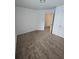 Standard bedroom featuring carpeted floors and a door to the hallway at 3613 Tinsley Sw Way, Atlanta, GA 30331