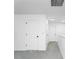 Bright hallway with white doors, fresh paint and carpeted floors at 3993 Makeover Ct, South Fulton, GA 30349