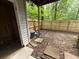 View of an unfinished backyard with new fence and air conditioning unit at 1104 Huntington Se Trce, Smyrna, GA 30082