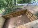 Birds eye view of fenced backyard with mature tree line at 1104 Huntington Se Trce, Smyrna, GA 30082