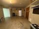 Spacious basement area with a refrigerator and storage space, ready for customization at 1104 Huntington Se Trce, Smyrna, GA 30082