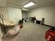 This basement has carpeted floors and white painted walls at 1104 Huntington Se Trce, Smyrna, GA 30082
