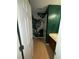 Stylish half bath with a tropical leaf mural on one wall; features a vessel sink at 1104 Huntington Se Trce, Smyrna, GA 30082