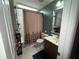 This bathroom has a shower/tub combo and a vanity at 1104 Huntington Se Trce, Smyrna, GA 30082