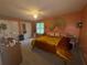 Cozy bedroom with neutral walls, a ceiling fan, and a comfortable bed at 1104 Huntington Se Trce, Smyrna, GA 30082