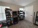 Bright bedroom featuring a window, a door, and shelving for games and shoes at 1104 Huntington Se Trce, Smyrna, GA 30082