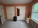 Spacious bedroom featuring multiple closets for storage and organization at 1104 Huntington Se Trce, Smyrna, GA 30082