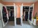 Bed room with divided closets for clothing and storage at 1104 Huntington Se Trce, Smyrna, GA 30082