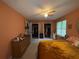 This main bedroom has multiple closets and carpeted floors at 1104 Huntington Se Trce, Smyrna, GA 30082