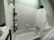 This shower/tub combo has tile backsplash and a shower head at 1104 Huntington Se Trce, Smyrna, GA 30082