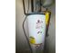 Rheem Fury gas water heater with visible pipes and connections is properly installed indoors at 1104 Huntington Se Trce, Smyrna, GA 30082