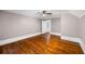 Bedroom featuring hardwood floors, a ceiling fan, and natural light at 159 S Forest S Ave, Social Circle, GA 30025