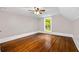 Bedroom featuring a ceiling fan, hardwood floors, and natural light at 159 S Forest S Ave, Social Circle, GA 30025