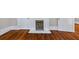 Bedroom fireplace with hardwood floors and white trim at 159 S Forest S Ave, Social Circle, GA 30025