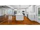 Open concept kitchen with stainless steel appliances and a central island at 159 S Forest S Ave, Social Circle, GA 30025