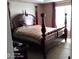 Bedroom featuring a large bed, neutral walls, and a window at 2918 Egret Ln, Austell, GA 30106