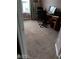 Bedroom featuring carpeted floors, large window with curtains, desk, and office chairs at 2918 Egret Ln, Austell, GA 30106
