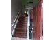 Welcoming entryway featuring a staircase with wooden steps and a red front door at 2918 Egret Ln, Austell, GA 30106