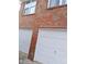 Two-car garage with white doors and a red brick exterior at 2918 Egret Ln, Austell, GA 30106