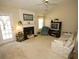 Inviting living room featuring a fireplace, ceiling fan, and cozy seating area at 2918 Egret Ln, Austell, GA 30106