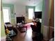 Cozy living room features a fireplace, laminate flooring, and ample space at 2918 Egret Ln, Austell, GA 30106