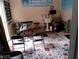 Room is decorated with religious posters, and has a keyboard set up, with folding chairs for seating at 2918 Egret Ln, Austell, GA 30106