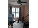 Home workout room equipped with exercise equipment, including a treadmill and elliptical machine at 2918 Egret Ln, Austell, GA 30106