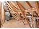 An unfinished attic shows exposed rafters, insulation, and HVAC system at 2948 Goldfinch Cir, Marietta, GA 30066