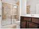 Modern bathroom featuring a combination tub/shower and updated fixtures at 2948 Goldfinch Cir, Marietta, GA 30066