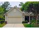 Charming one-story home with a two-car garage, manicured lawn and mature trees offering great curb appeal at 2948 Goldfinch Cir, Marietta, GA 30066
