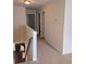 A hallway leading to other parts of the house with carpet and neutral walls at 2948 Goldfinch Cir, Marietta, GA 30066