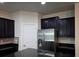 Modern kitchen featuring dark cabinets, stainless steel appliances, and granite countertops at 2948 Goldfinch Cir, Marietta, GA 30066