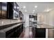 Modern kitchen boasting dark cabinets, stainless steel appliances, and granite countertops at 2948 Goldfinch Cir, Marietta, GA 30066