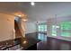 Open-concept living room view from the kitchen featuring lots of natural light and hardwood floors at 2948 Goldfinch Cir, Marietta, GA 30066