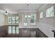 Bright living room with beautiful hardwood floors, a ceiling fan, and large windows at 2948 Goldfinch Cir, Marietta, GA 30066