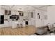 Modern kitchen with white cabinetry, stainless steel appliances, and center island with seating at 1401 Rupert Rd, Decatur, GA 30030