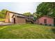 Spacious backyard with a shed and a deck at 1526 Tanglewood Nw Way, Conyers, GA 30012